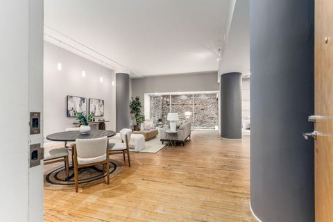 Photo of 106 N High Street 302 #302, Columbus, OH 43215 (MLS # 226009608)