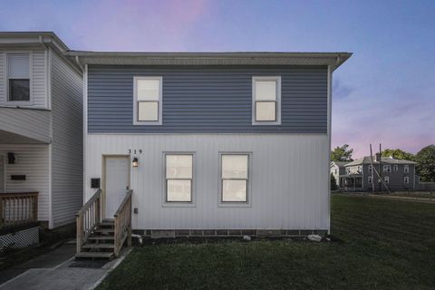 Photo of 319 E Barthman Avenue, Columbus, OH 43207 (MLS # 225033086)