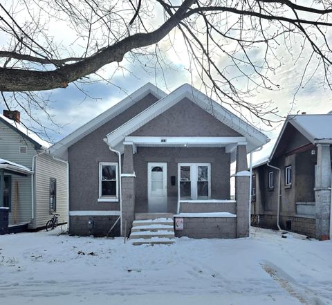 Photo of 519 Locust Street, Coshocton, OH 43812 (MLS # 225045621)