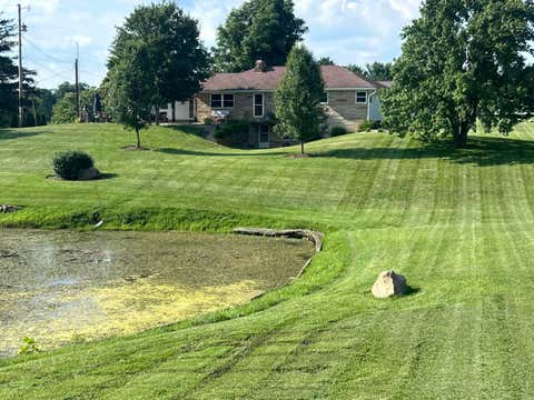 Photo of 228 Coonpath Road NE, Lancaster, OH 43130 (MLS # 226016484)