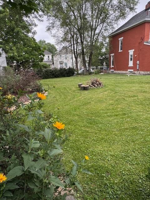 Photo of 69 E Woodrow Avenue, Columbus, OH 43207 (MLS # 225022193)