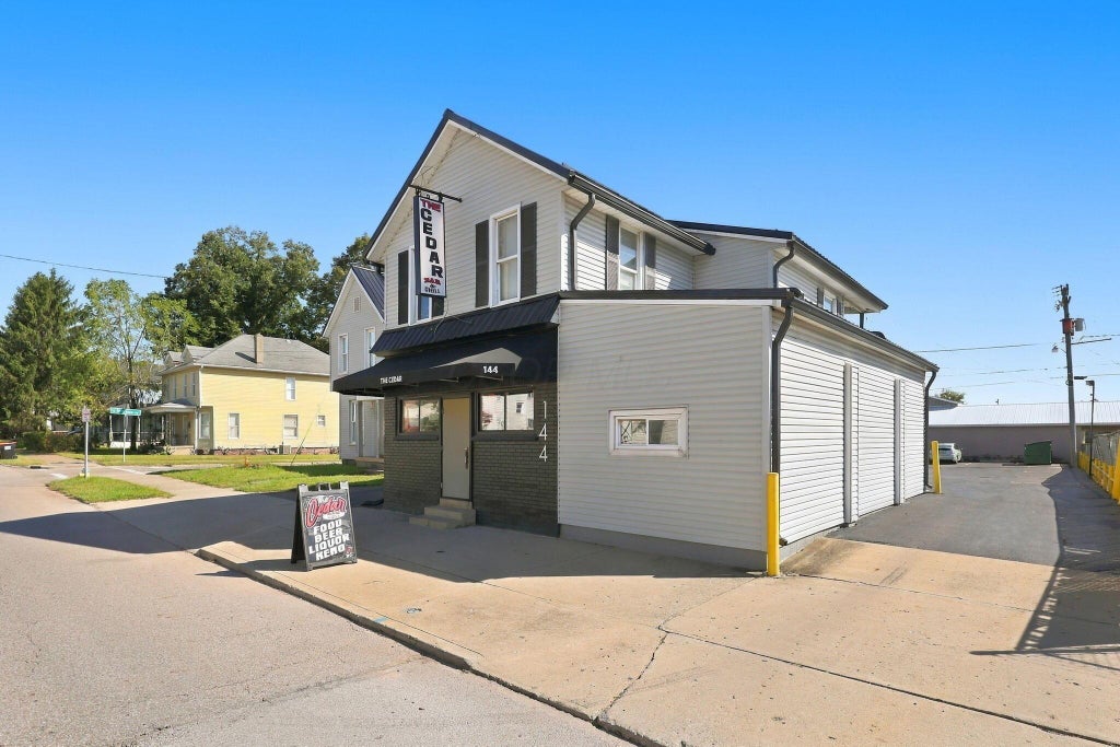 Photo of 144 N Cedar Street, Newark, OH 43055 (MLS # 226037211)