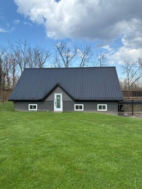 Photo of 10021 W Triadelphia Road NW, Crooksville, OH 43731 (MLS # 226010335)