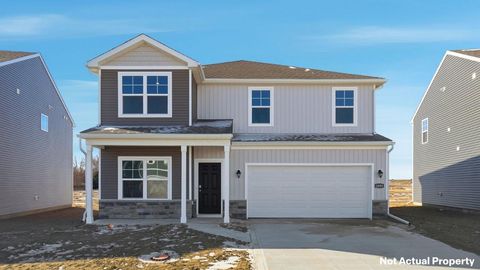 Photo of 1026 Sherwood Loop, Bellefontaine, OH 43311 (MLS # 226012603)