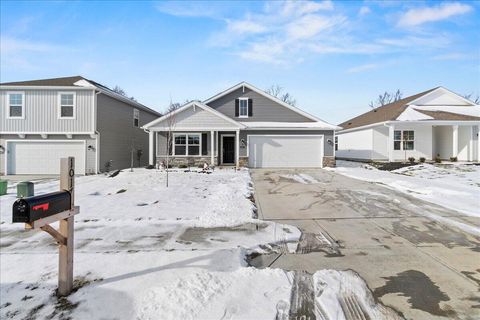 Photo of 1017 Sherwood Loop, Bellefontaine, OH 43311 (MLS # 226000487)