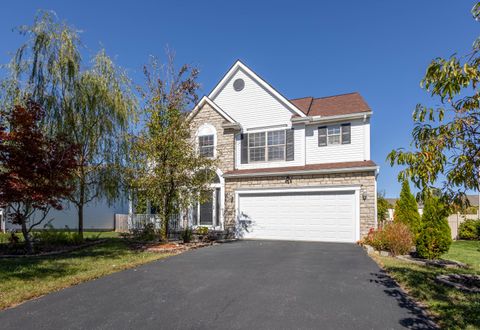 Photo of 705 Woodington Drive, Pataskala, OH 43062 (MLS # 225039061)