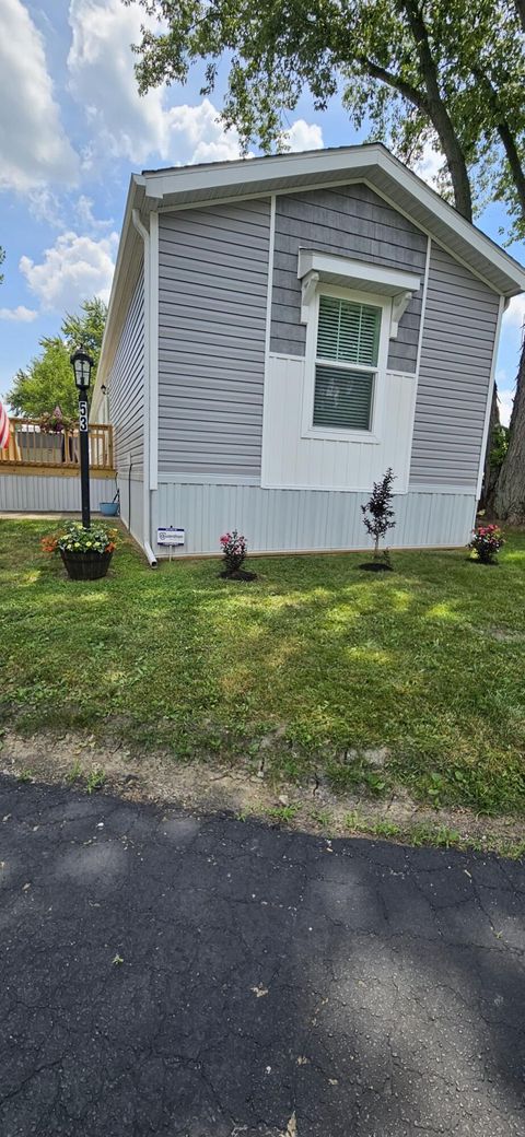 Photo of 8565 Smith Calhoun Road 53-0 #53-0, Plain City, OH 43064 (MLS # 225037014)