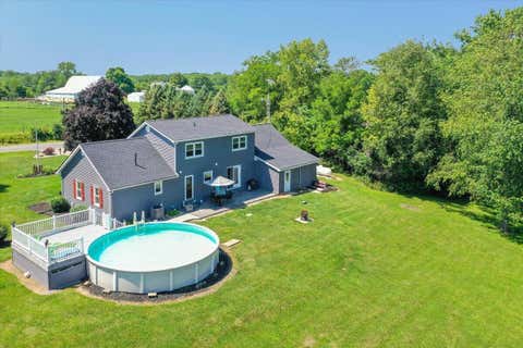 Photo of 1380 County Road 11, Bellefontaine, OH 43311 (MLS # 226028898)