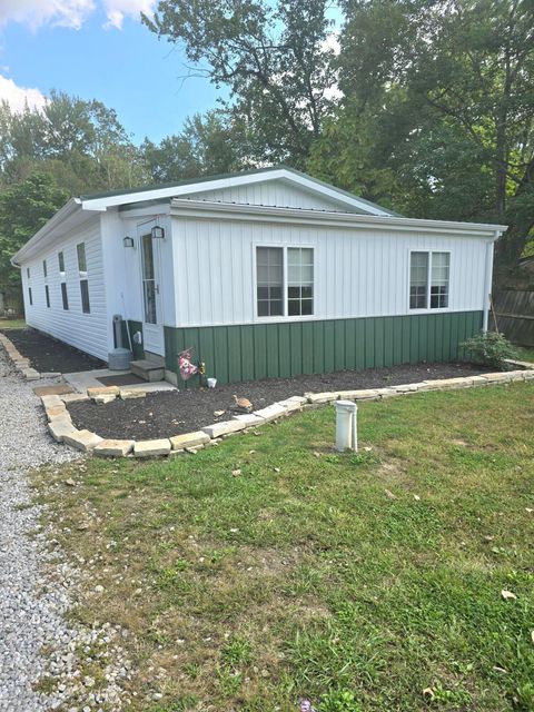 Photo of 411 S Merritt Road SW, Pataskala, OH 43062 (MLS # 225036931)