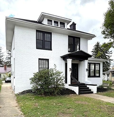 Photo of 402 Mckinley Avenue, Crooksville, OH 43731 (MLS # 225040334)