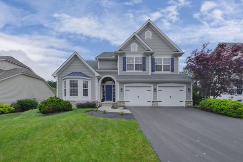 Photo of 606 Matthews Brook Lane, Powell, OH 43065 (MLS # 226018630)