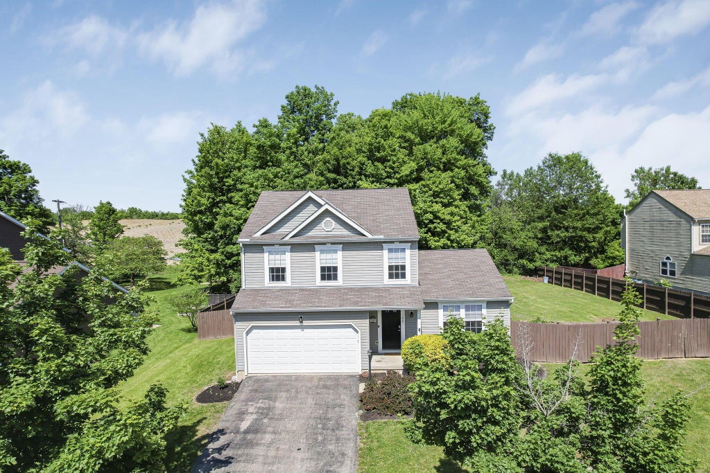 Photo of 166 Woodhaul Drive, Delaware, OH 43015 (MLS # 226019468)
