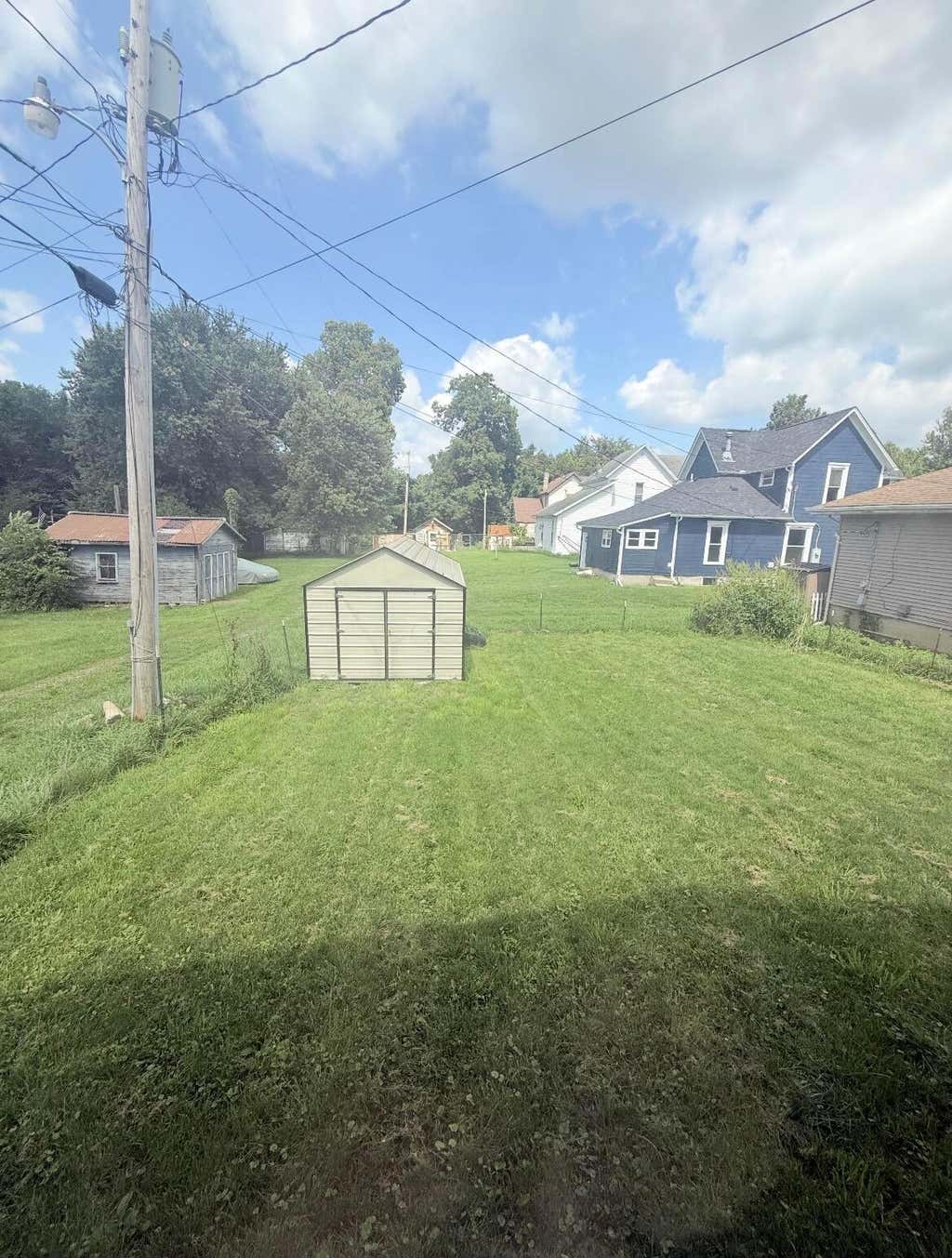 Photo of 304 W High Avenue, Bellefontaine, OH 43311 (MLS # 226032315)