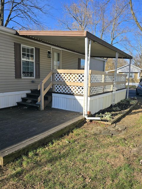 Photo of 214 Estates Lane Lane, Reynoldsburg, OH 43068 (MLS # 224043123)