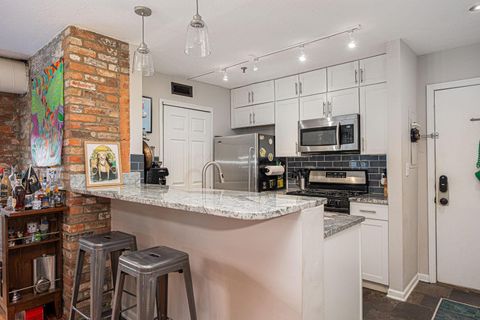 Photo of 51 W Blenkner Street 106 #106, Columbus, OH 43215 (MLS # 225032091)