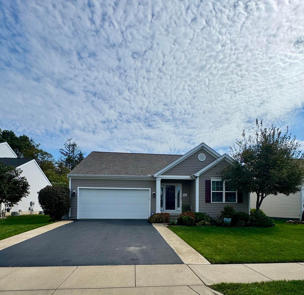 Photo of 234 Rockbrook Crossing Avenue, Galloway, OH 43119 (MLS # 226037357)