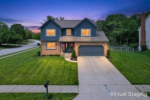 Photo of 323 Village Ridge Drive, Powell, OH 43065 (MLS # 226021450)
