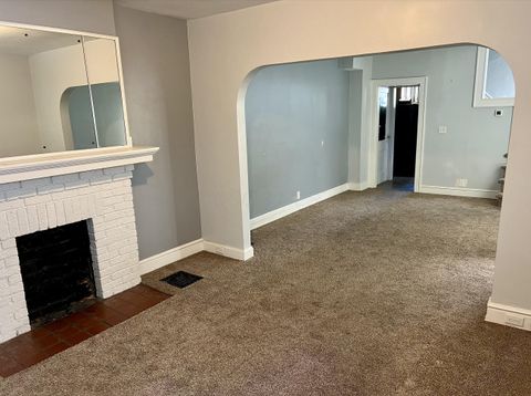 Photo of 212 E Hudson Street, Columbus, OH 43202 (MLS # 225041858)