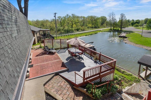 Photo of 8095 Blue Heron Cv, Huntsville, OH 43324 (MLS # 226016154)