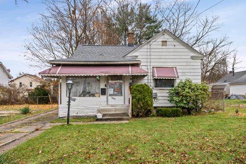 Photo of 1067 Mercer Avenue, Akron, OH 44320 (MLS # 225044427)