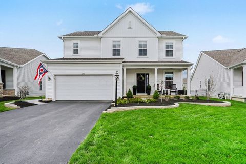 Photo of 210 Warbler Lane, Plain City, OH 43064 (MLS # 226011647)