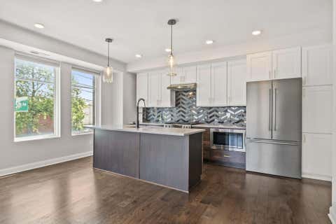 Photo of 207 E 5th Avenue, Columbus, OH 43201 (MLS # 226030085)