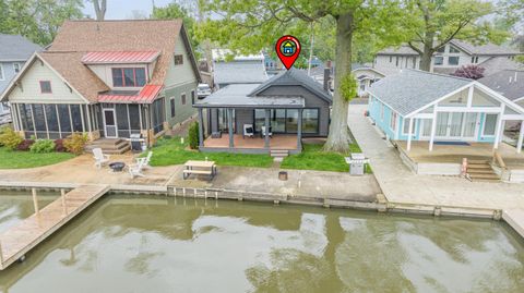 Photo of 7925 Hickory Avenue, Russells Point, OH 43348 (MLS # 225023698)