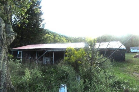 Photo of 4308 Flat Road SE, Uhrichsville, OH 44683 (MLS # 226036338)