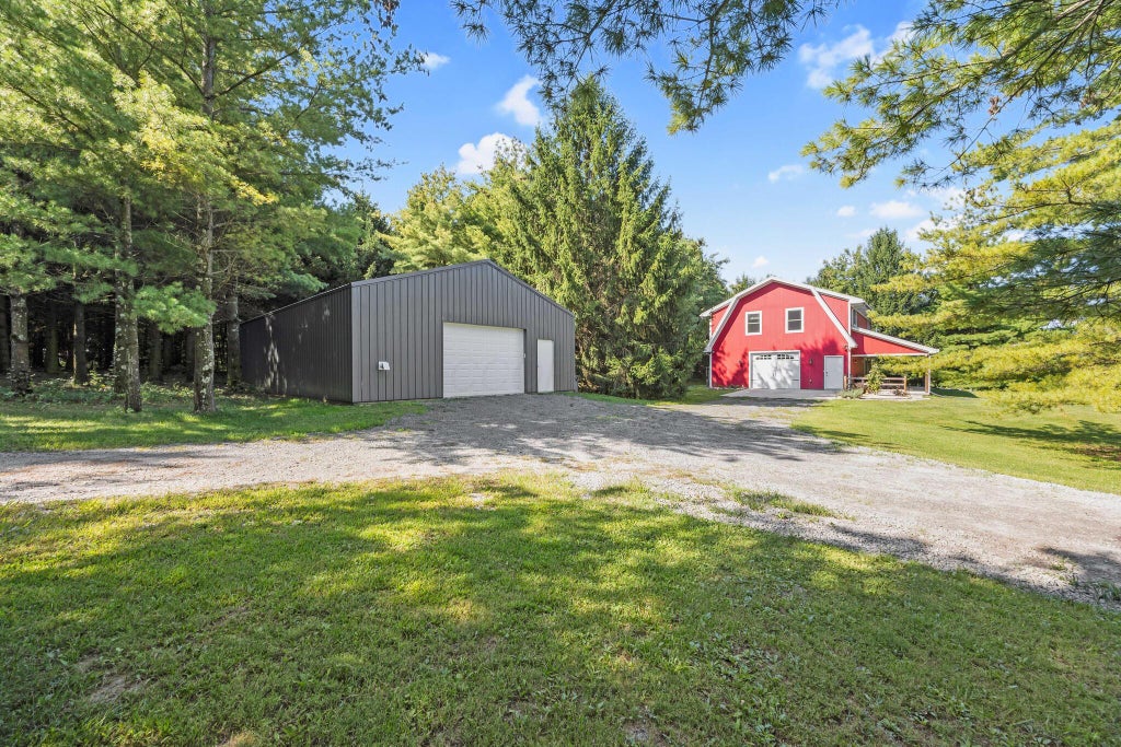 Photo of 320 County Road 57 W, Bellefontaine, OH 43311 (MLS # 226034788)