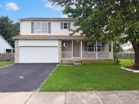 Photo of 208 Isaac Tharp Street, Pataskala, OH 43062 (MLS # 226036331)