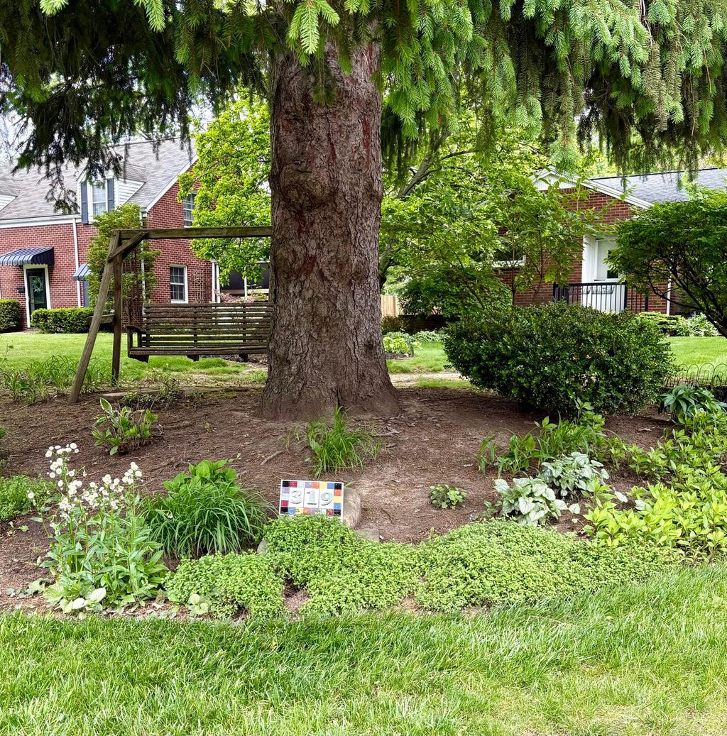 Photo of 319 Bachtel Street SE, North Canton, OH 44720 (MLS # 226017308)