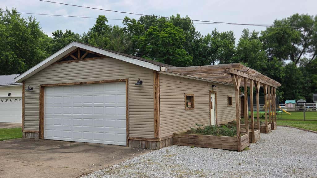Photo of 108 Washington Street, Coshocton, OH 43812 (MLS # 226020812)