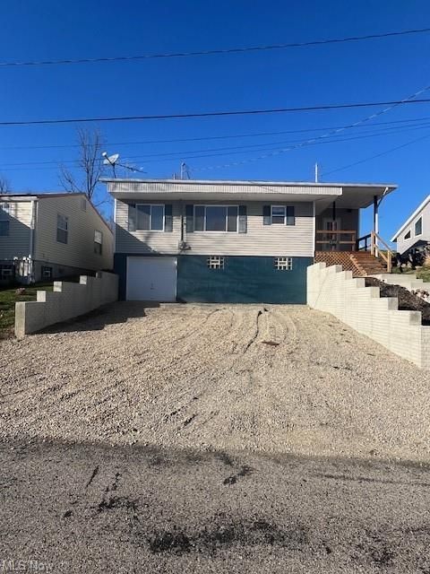 Photo of 23458 Hideaway Drive, Senecaville, OH 43780 (MLS # 226011209)