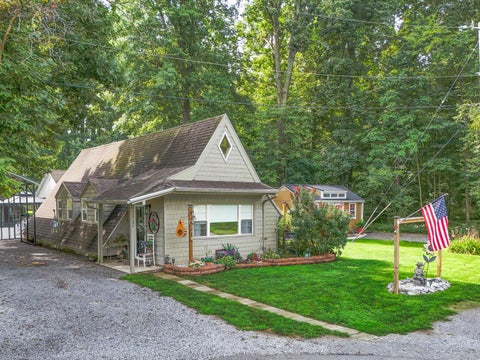 Photo of 10731 Piqua Drive, Huntsville, OH 43324 (MLS # 226034914)