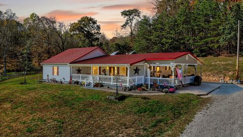 Photo of 392 Owl Creek Road, Lucasville, OH 45648 (MLS # 225040740) Photo of 392 Owl Creek Road, Lucasville, OH 45648 (MLS # 225040740)