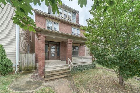 Photo of 229 E 11th Avenue, Columbus, OH 43201 (MLS # 225034138)