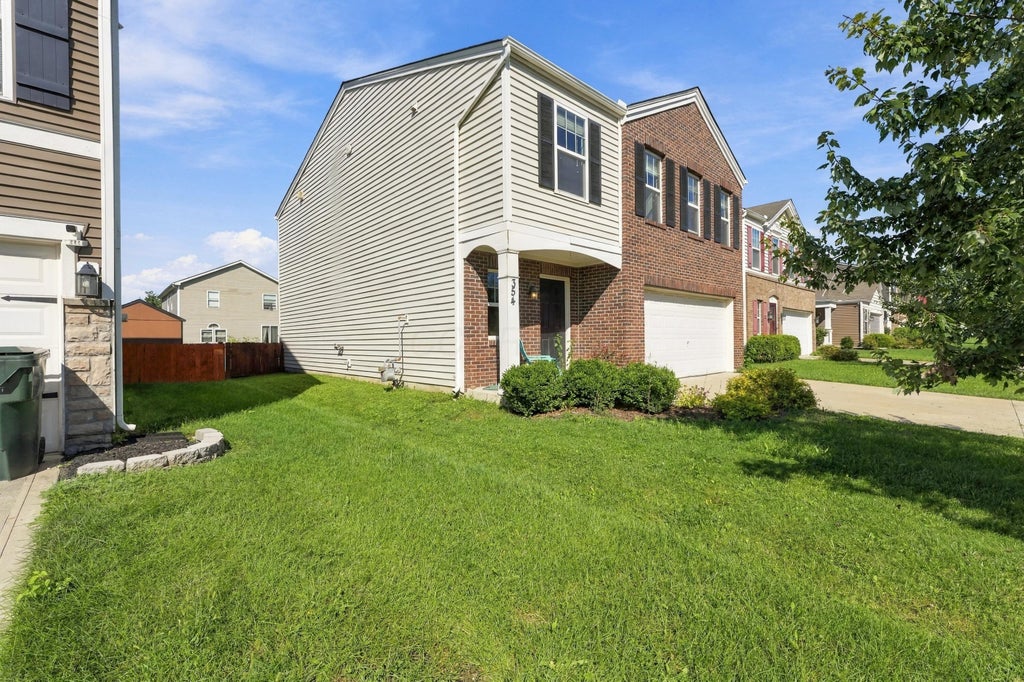 Photo of 354 Kear Street, Lockbourne, OH 43137 (MLS # 226037353)