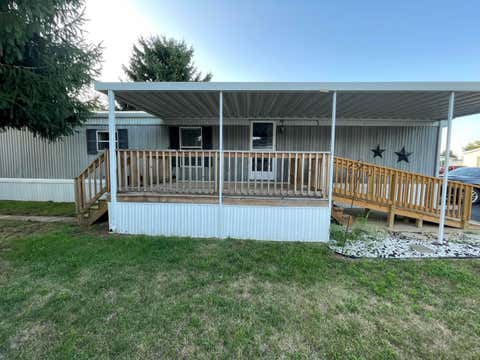 Photo of 143 Oak Manor, South Bloomfield, OH 43103 (MLS # 226027999)
