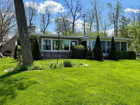 Photo of 10436 Seminole Shore Drive, Huntsville, OH 43324 (MLS # 226012910)