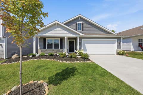 Photo of 1017 Sherwood Loop, Bellefontaine, OH 43311 (MLS # 226030543)