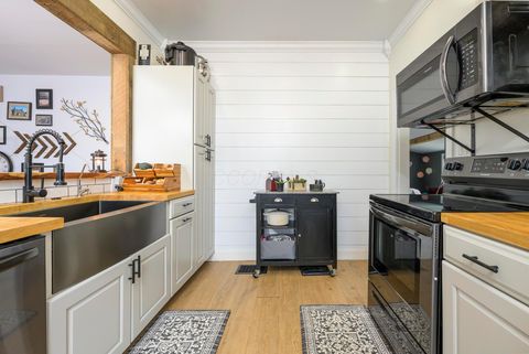 Tiny photo for 311 E Columbus Street, West Liberty, OH 43357 (MLS # 225045471)