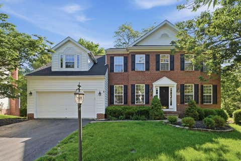 Photo of 452 Sunridge Drive, Powell, OH 43065 (MLS # 226020107)