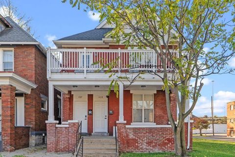 Photo of 437-439 St Clair Avenue, Columbus, OH 43203 (MLS # 225046464)