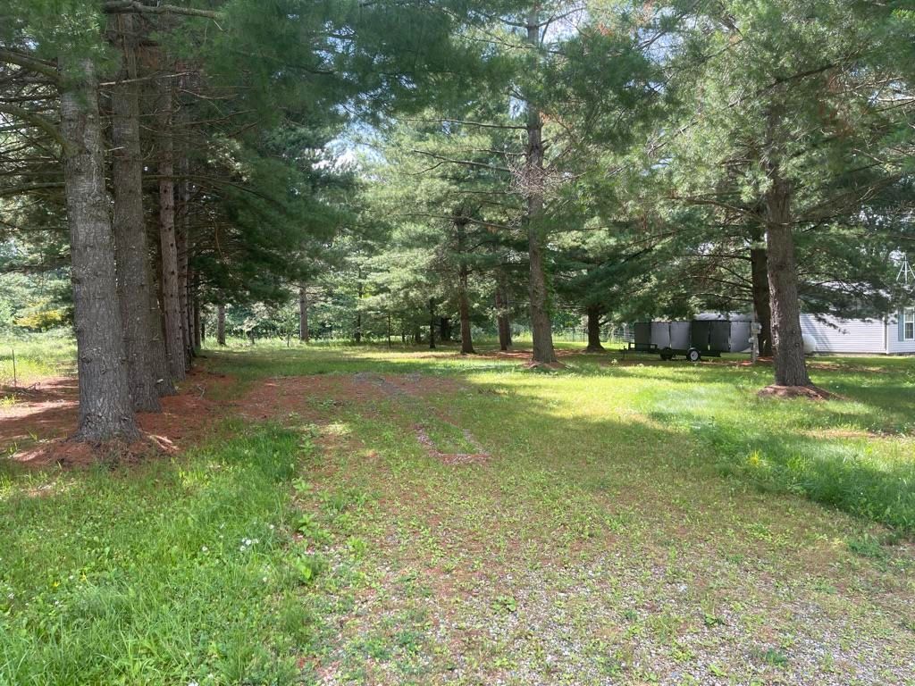 Photo of 5404 WINCHESTER Way #243 Winchester Way, Gladwin, MI 48624 (MLS # 50182927)