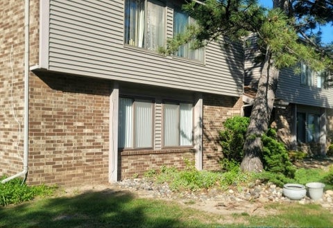 Photo of 1048 Grenoble Lane Unit A, Lansing, MI 48917 (MLS # 50209203)