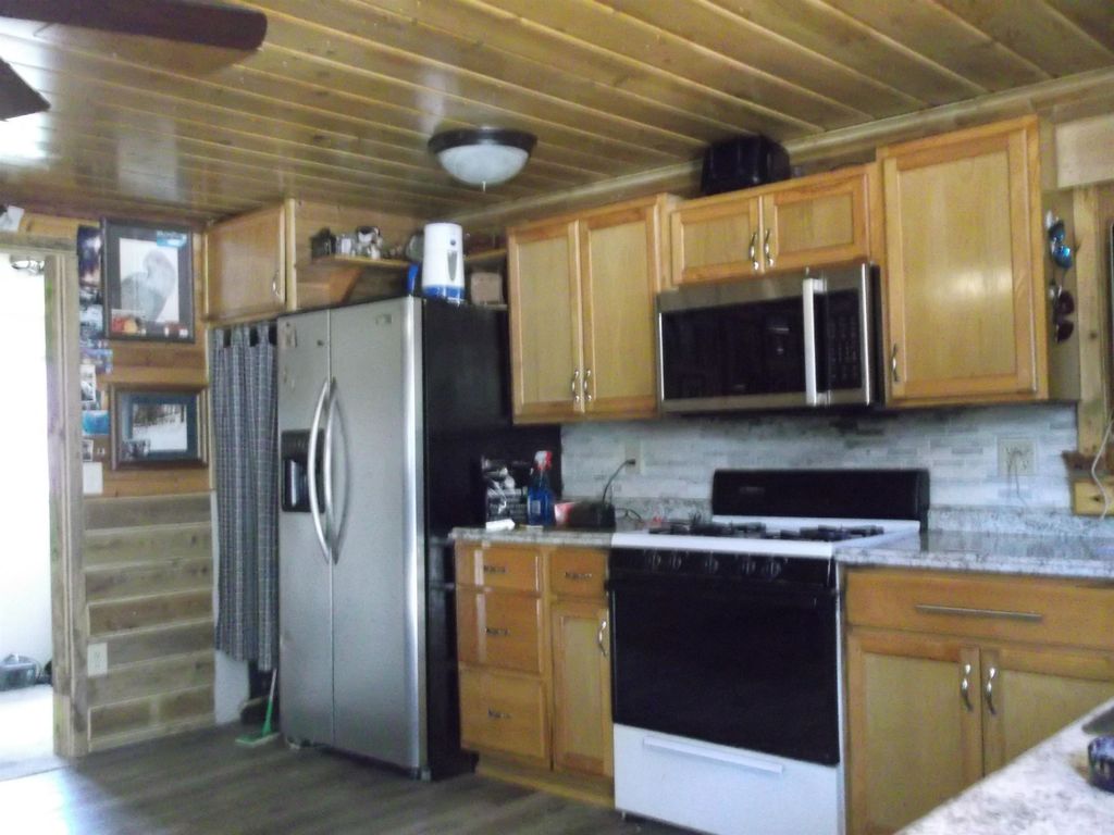 Photo of 992 Lake Drive, Harrison, MI 48625 (MLS # 50205033)