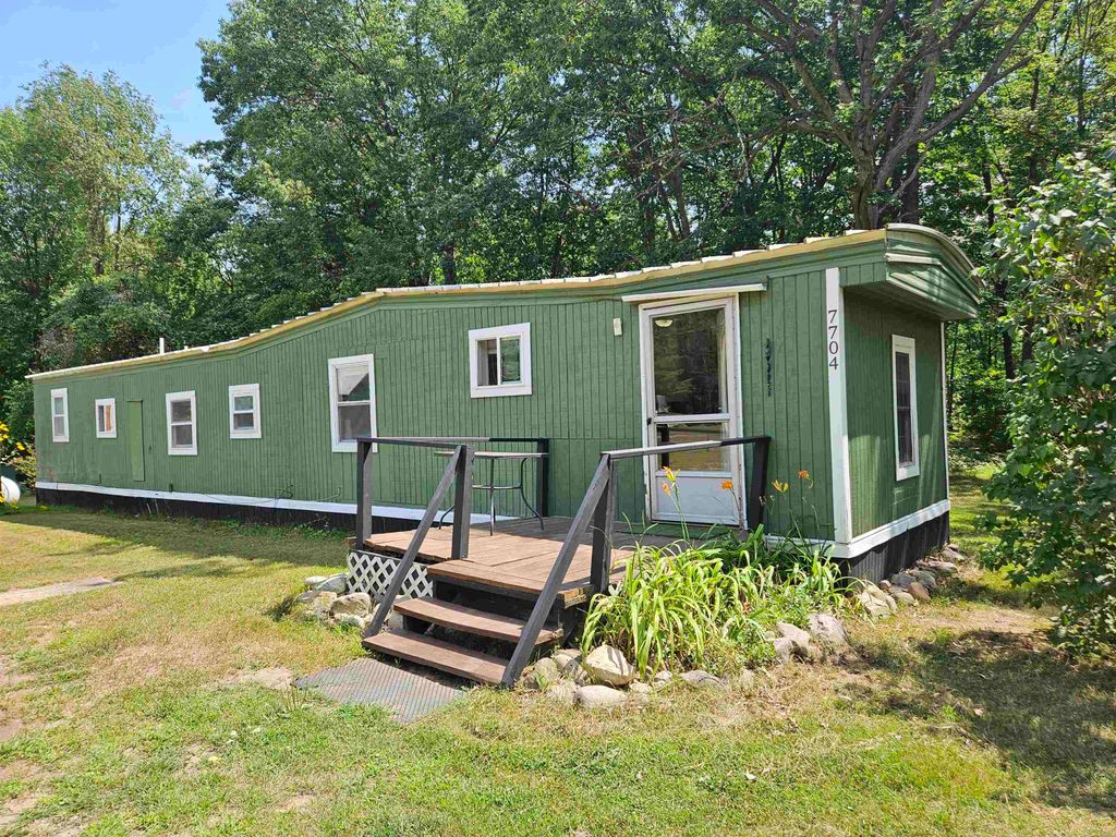 Photo of 7704 N Bass Lake Road, Harrison, MI 48625 (MLS # 50185142)