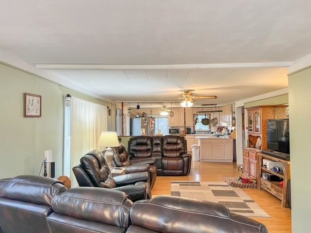 Photo of 7020 E Arnold Lake Road, Harrison, MI 48625 (MLS # 50200677)