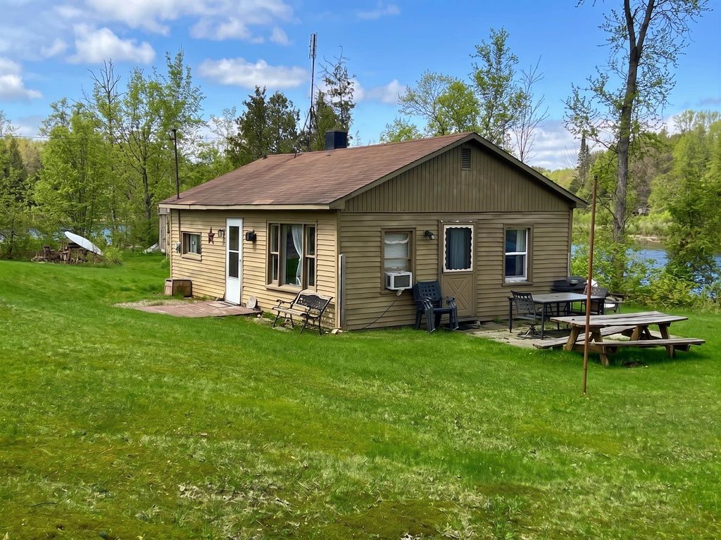 Photo of 5641 Lakeside Drive, Gladwin, MI 48624 (MLS # 50205577)
