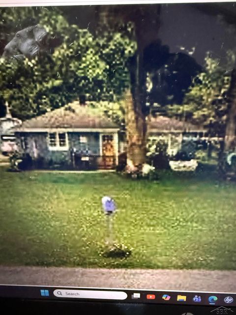 Photo of 7825 SWANCREEK Road, Saginaw, MI 48608 (MLS # 50201634)